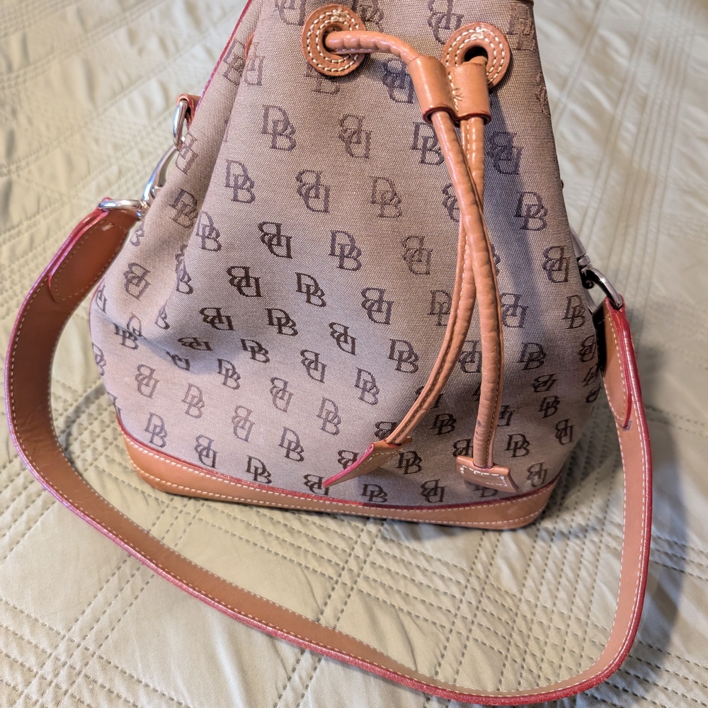 Dooney & Bourke Pink and Tan Backpack with Monogram Pattern